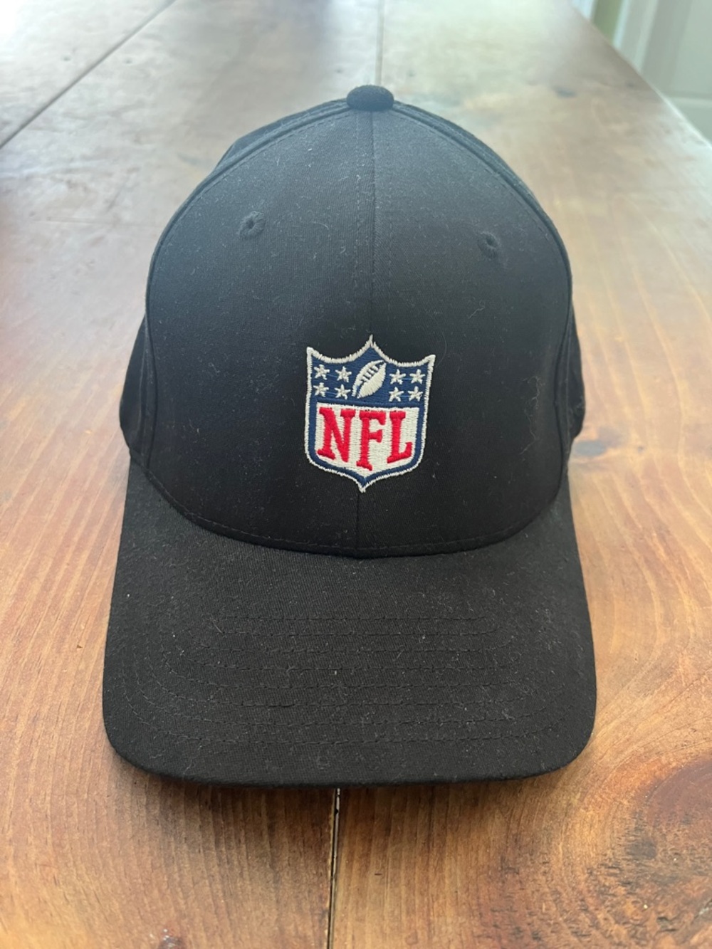 NFL Black Baseball Cap with Embroidered Shield